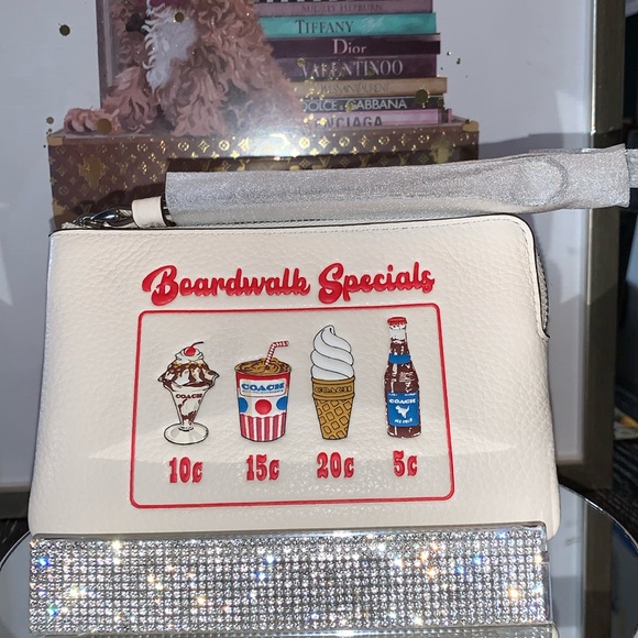 Coach Handbags - Coach (NWT) Corner Zip Wristlet  Boardwalk Graphic